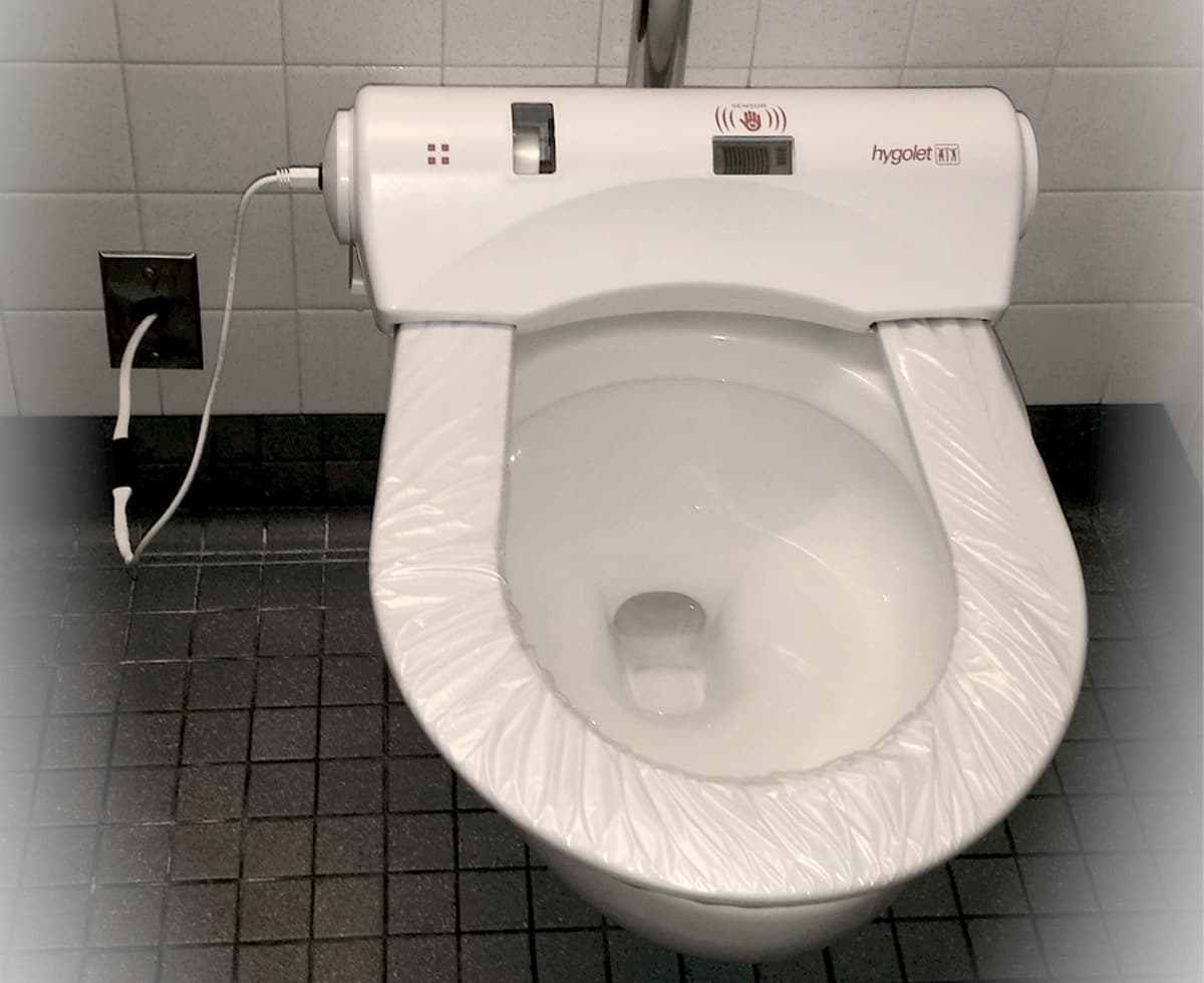 Hygolet automated toilet seat unit installed in restroom